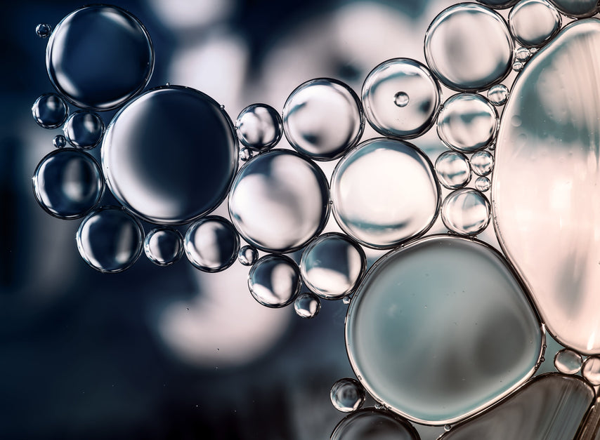 Close-up of bubbles in a liquid with a blurred background