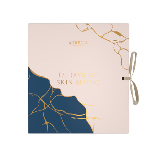Aurelia London '12 Days of Skin Magic' product packaging with gold and blue design on a beige background.