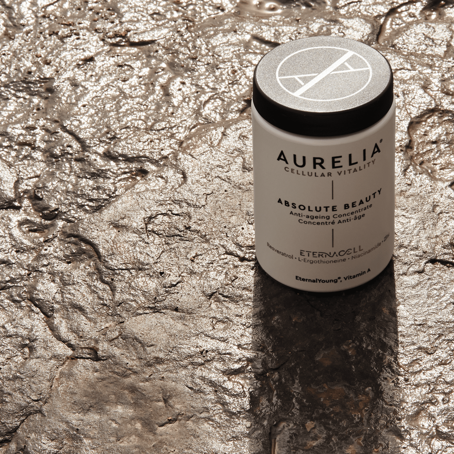 Aurelia absolute beauty product on a textured stone surface
