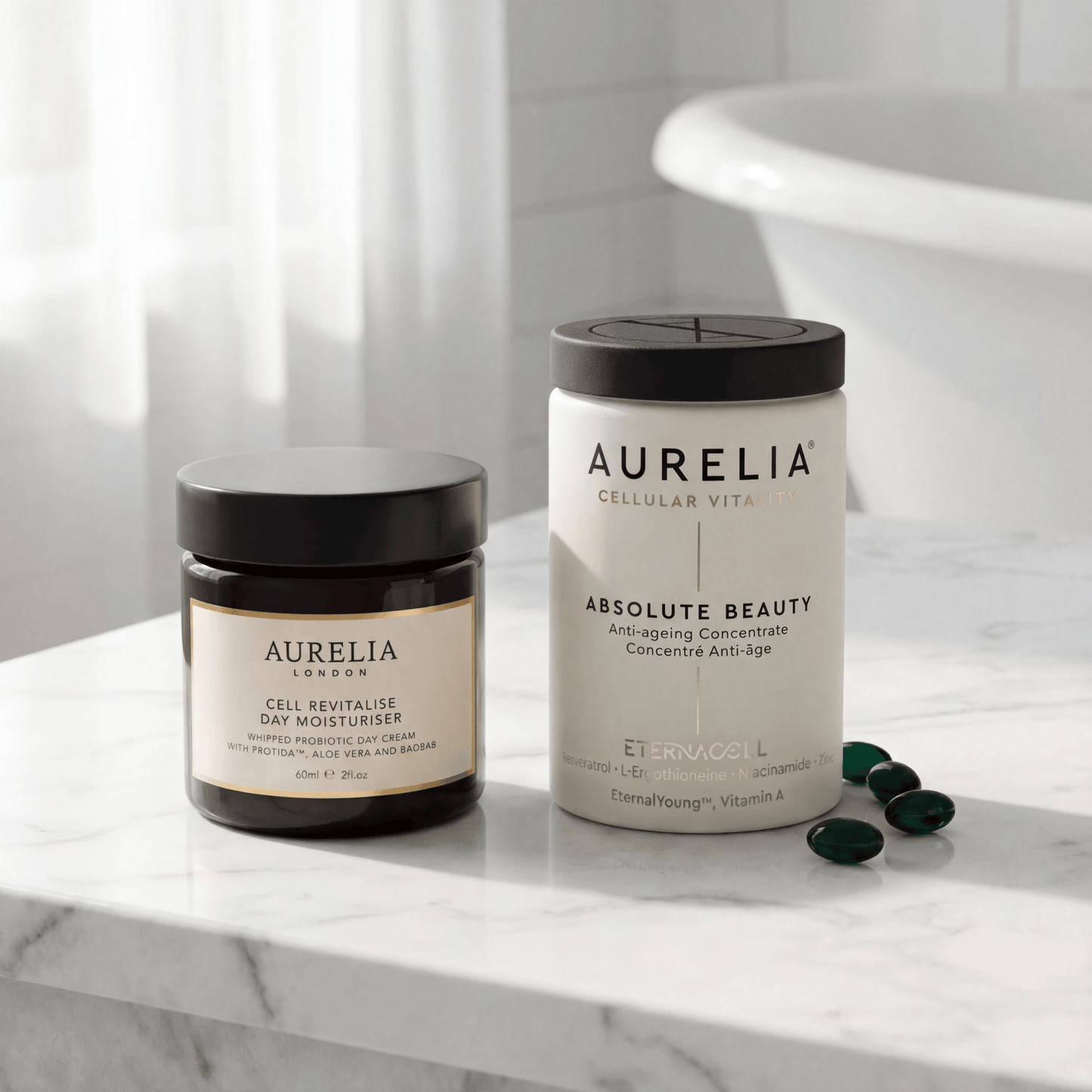 Aurelia Cell Revitalise Day Moisturiser and Absolute Beauty on a marble surface with a blurred background