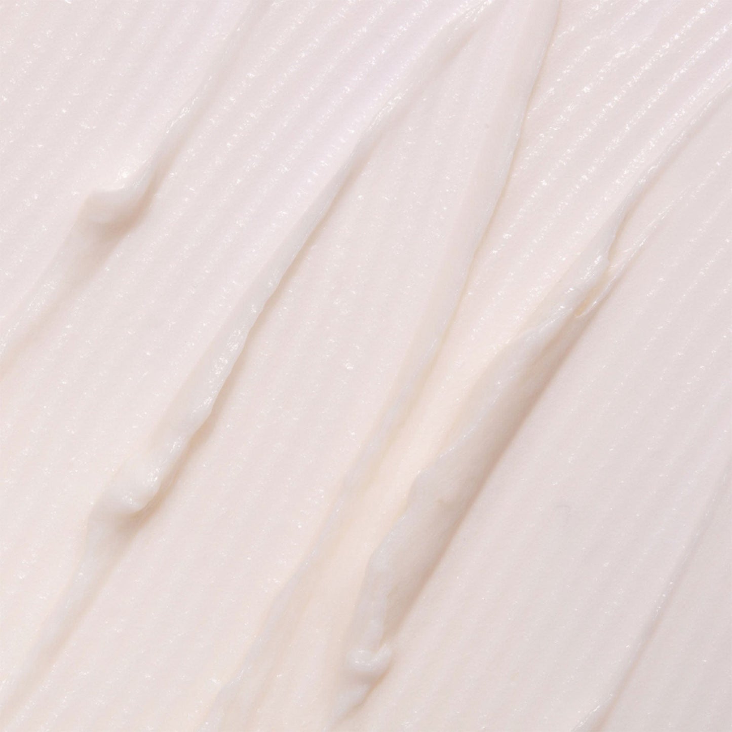 Close-up of beige cell revitalise night moisturiser with a soft texture