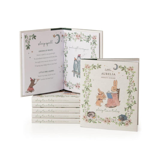 Set of children's books with floral and character illustrations on a white background