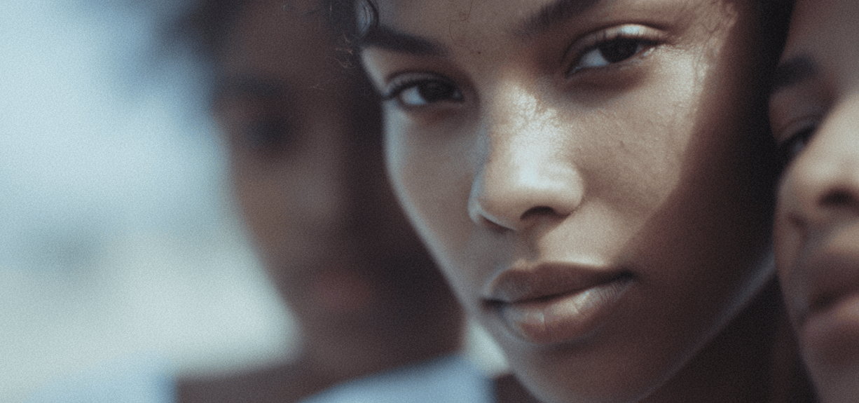 Close-up of a woman's face with a blurred background