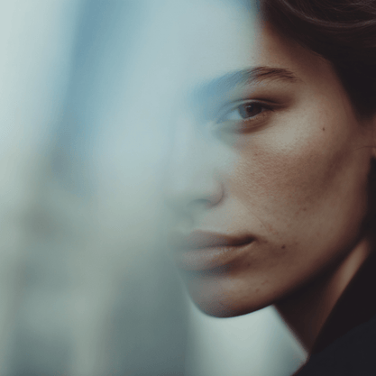 Close-up of a person's face with a blurred background