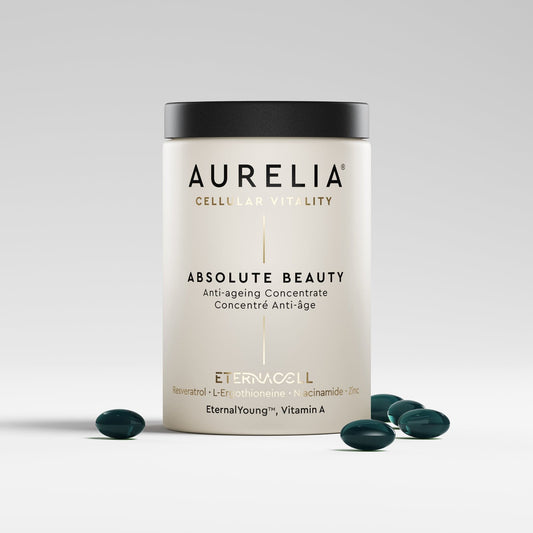 Aurelia Absolute Beauty supplement container with capsules on a light gray background