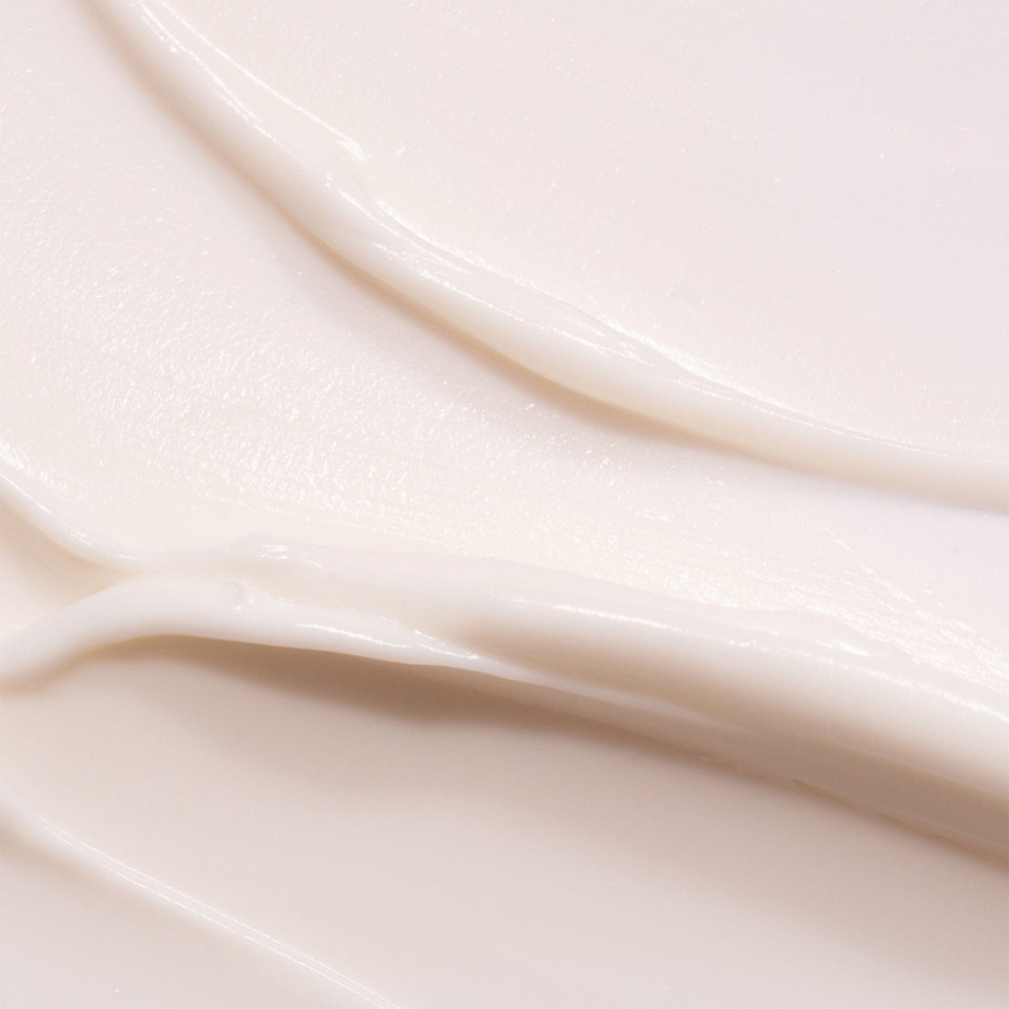 Close-up of smooth, beige hand cream 