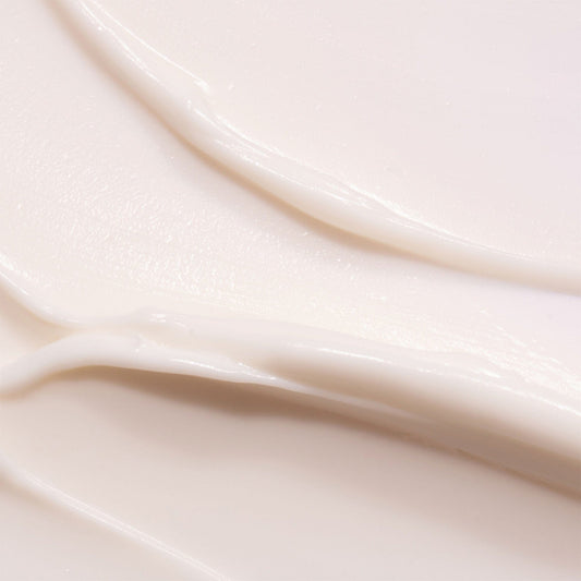 Close-up of smooth, beige hand cream 