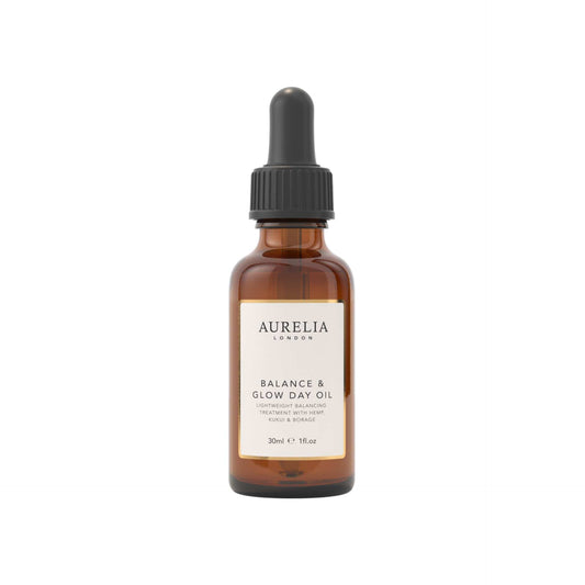 Aurelia Balance & Glow Day Oil bottle with dropper on a white background