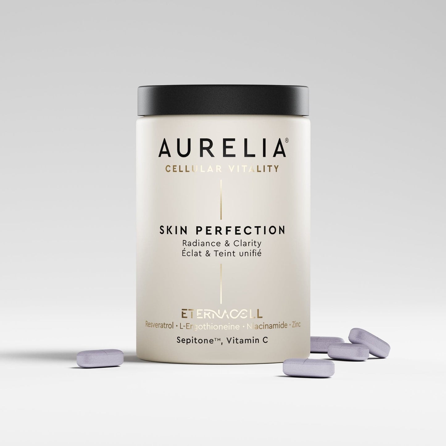 Aurelia Skin Perfection supplement container with pills on a light gray background