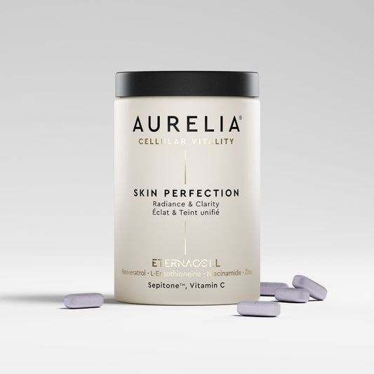 Aurelia Skin Perfection supplement container with pills on a light gray background